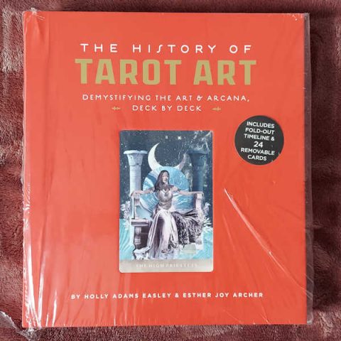 the slipcover of the book The History of Tarot Art